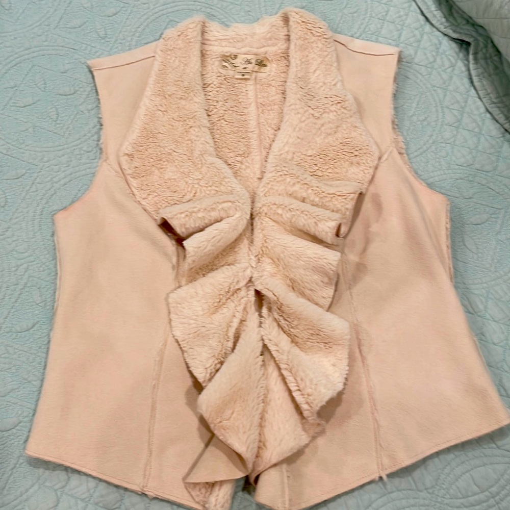 Suede like vest with faux fur lining and front ruffle